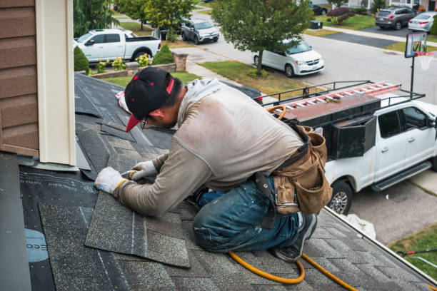 Professional Roofing technician working in Montgomery, IL